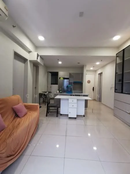 Living features: orange fabric sofa, two pink cushions, white tiled flooring, recessed ceiling lights, wall-mounted air conditioning unit, open-plan layout, glass display cabinet, dining table with chairs, kitchen island with seating; style: modern.