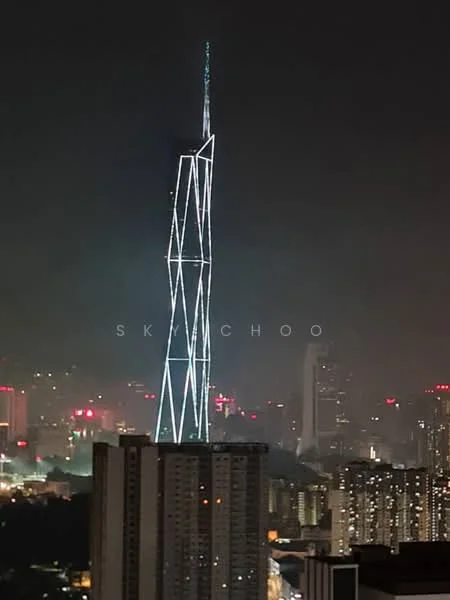 Exterior features: night view, city skyline, illuminated tower, high-rise buildings in foreground, urban landscape; style: modern.