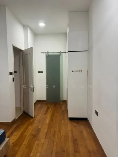 Room features: wooden flooring, white painted walls, sliding glass door, built-in wardrobe, recessed ceiling lights, wall-mounted hooks; style: modern.