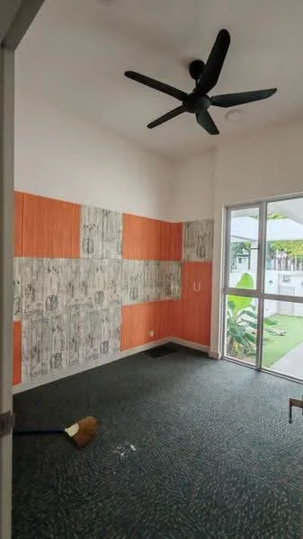 Room features: orange accent wall, textured wallpaper, white painted walls, ceiling fan, sliding glass door, green carpet flooring, window with view to garden, broom on floor; style: modern; view: garden.