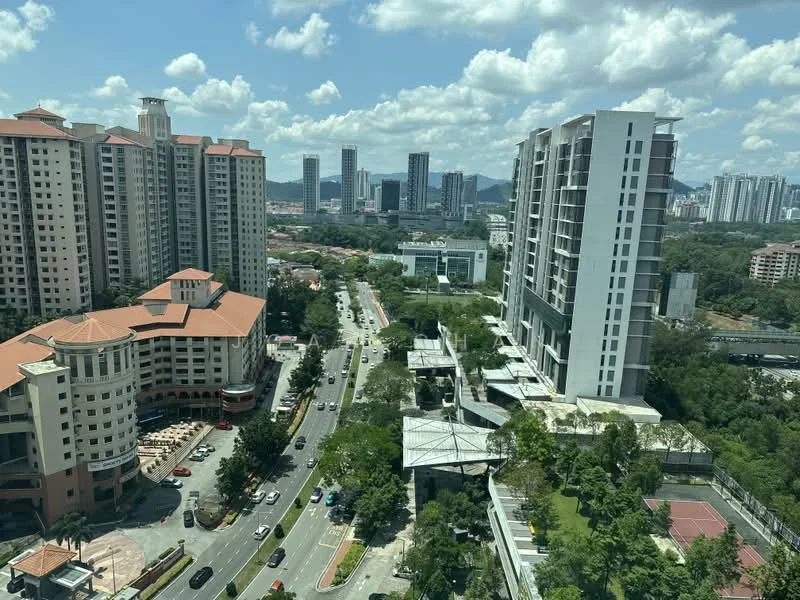Exterior type: high-rise condominium; features: glass curtain wall, white painted facade, red tiled roof, surrounded by mature greenery, adjacent to highway, urban context with city skyline in background; style: modern.