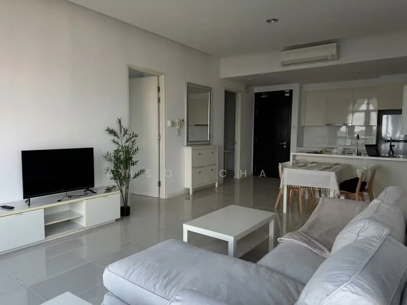 Living features: light grey fabric sectional sofa, white coffee table, TV console with storage, wall-mounted flat-screen TV, white dining table with wooden legs, 4 wooden dining chairs, large mirror on wall, white painted walls, glossy tile flooring, air conditioning unit on wall, potted plant in corner; style: modern.