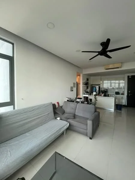 Living features: grey fabric sofa, light grey slipcover on sofa, glass coffee table, white walls, recessed downlights, ceiling fan, tile flooring, floor-to-ceiling windows, open layout to kitchen, kitchen island visible in background; style: modern.