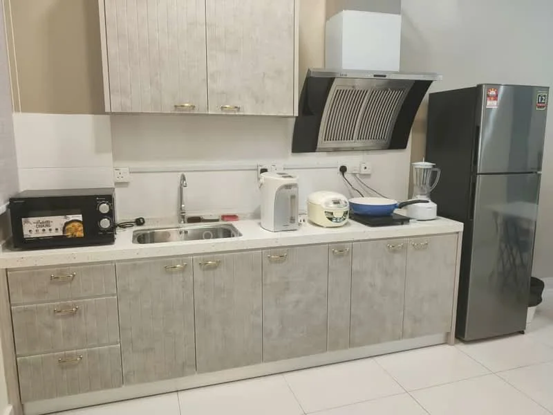 Kitchen features: light grey cabinetry with gold handles, white countertop, single-bowl stainless-steel sink, chrome pull-down faucet, built-in oven, microwave, blender, electric kettle, stainless-steel fridge, exhaust hood, ceramic tile flooring, wall-mounted cabinets, open shelving; style: modern.