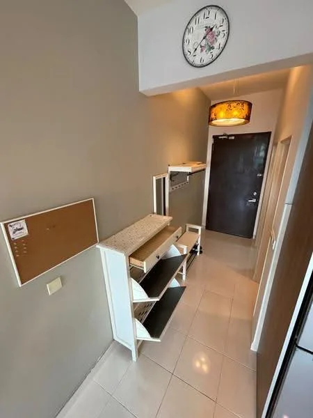 Room features: grey painted walls, white tiled flooring, wall-mounted clock, ceiling light fixture, wooden door, coat rack, open shelving unit, corkboard, mirror, narrow hallway layout; style: modern.