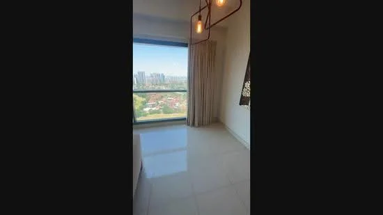 Room features: large floor-to-ceiling window, city skyline view, cream painted walls, light-colored tiled flooring, hanging light fixture with multiple bulbs, sheer curtains, decorative window treatment; style: modern; view: city.