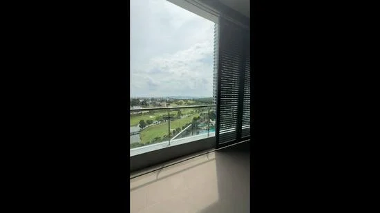 Room features: floor-to-ceiling windows, sliding glass door, roller blinds, view of landscaped area, view of swimming pool, grey tiled flooring, natural light from large window, balcony access; style: modern; view: garden.