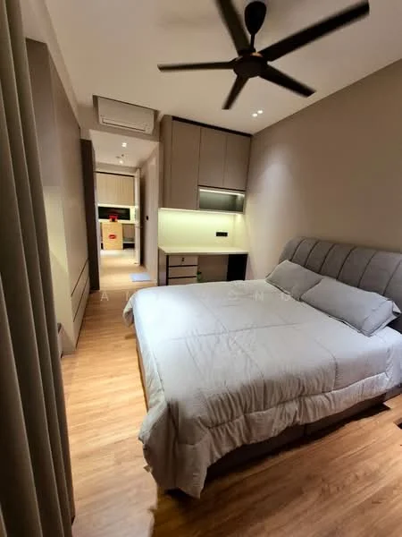 Bedroom features: king-size bed with grey upholstered headboard, bedding in light grey, wooden flooring, ceiling fan with 3 blades, built-in wardrobe with sliding doors, wall-mounted light fixtures, neutral painted walls, recessed lighting, desk area with built-in cabinetry, window with sheer curtains; style: modern.