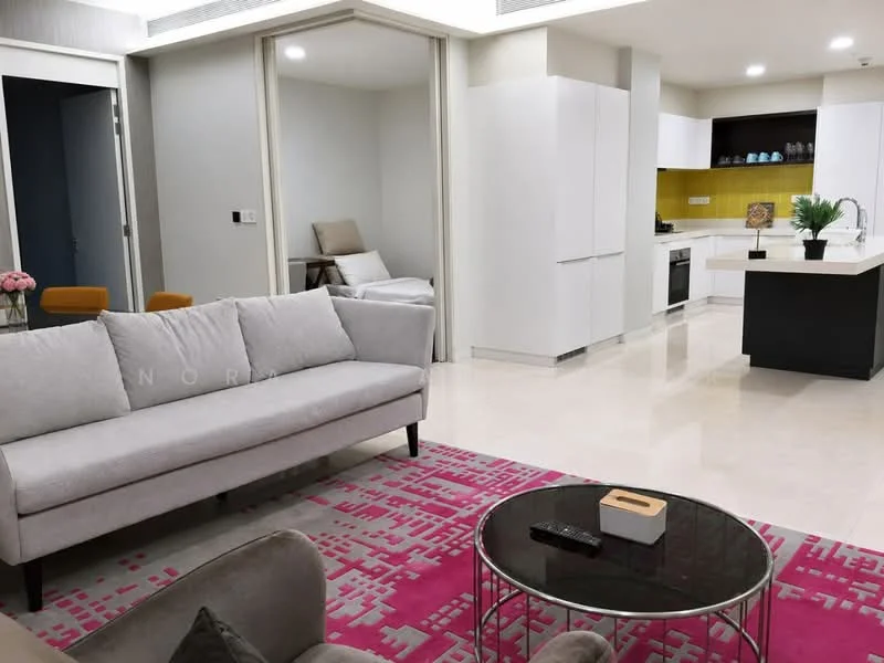 Living features: 3-seater fabric sofa in light grey, coffee table with circular glass top, area rug with geometric pattern in pink, wall-mounted TV, decorative wall art, floor-to-ceiling windows, marble tile flooring, recessed downlights; style: modern. Kitchen features: white cabinetry, yellow backsplash, stainless-steel built-in oven, stainless-steel range hood, 4-burner gas hob, single-bowl stainless-steel sink, chrome pull-down faucet, open shelving; style: modern. Room features: grey accent wall, folding partition, decorative plant.
