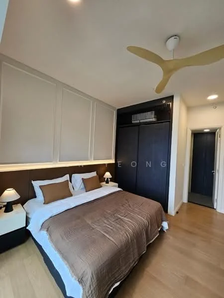 Bedroom features: king-size bed with brown bedding, upholstered headboard, two bedside lamps, built-in wardrobe with sliding doors, wooden flooring, recessed lighting, ceiling fan, neutral wall color, decorative wall paneling; style: modern.