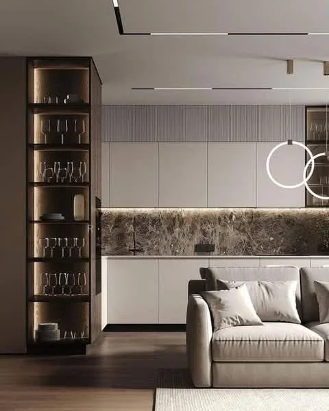 Kitchen features: white cabinetry with flat-panel doors, marble backsplash, black countertop, stainless-steel sink, chrome pull-down faucet, open shelving with glassware, recessed LED downlights, pendant lighting, wooden flooring, integrated appliances, modern design; style: modern.