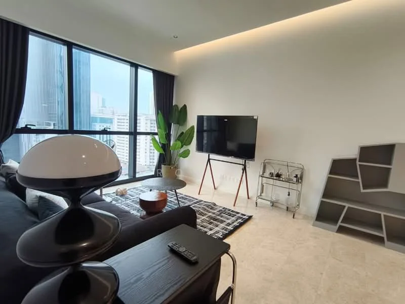 Living features: floor-to-ceiling windows, blackout curtains, 3-seater fabric sofa in dark grey, coffee table, TV console, wall-mounted TV, decorative plant, area rug with geometric pattern, side table, decorative shelving unit, remote control on side table, light fixture with dome shade; style: modern; view: city.