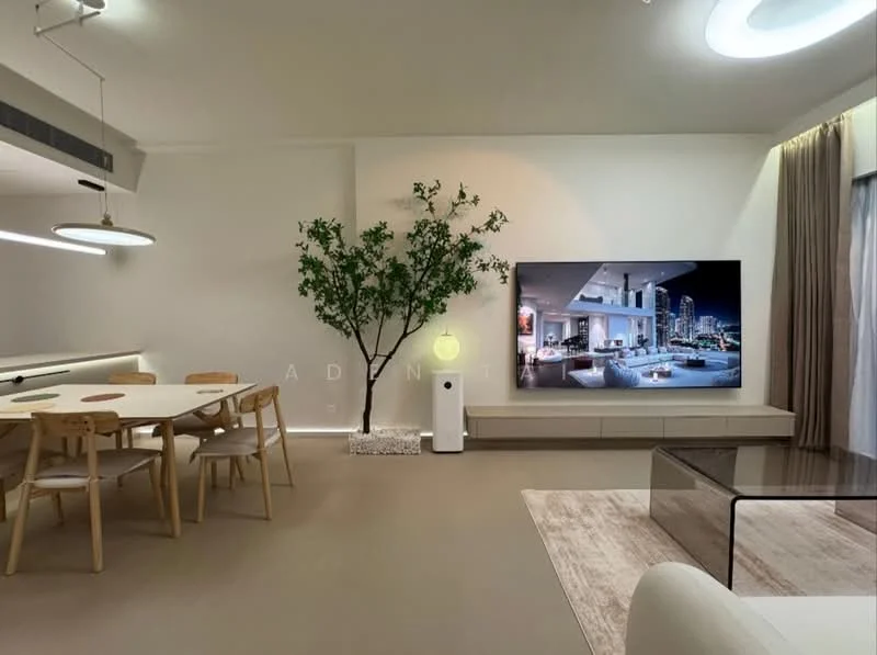 Living features: light beige walls, smooth ceiling, recessed downlights, large wall-mounted TV, glass coffee table, white entertainment unit, wooden dining table with four chairs, decorative indoor tree, beige area rug, floor-to-ceiling windows with sheer curtains; style: modern; view: city.