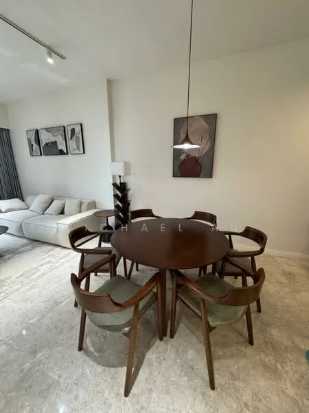 Dining features: round dining table, wooden dining table, 6 upholstered dining chairs, pendant lamp, light-colored walls, marble flooring, decorative artwork on walls, sofa in background; style: modern.