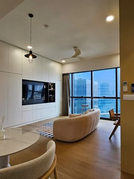 Living features: 3-seater curved fabric sofa in beige, coffee table with white surface, wall-mounted TV, built-in cabinetry with white finish, pendant light fixture, 5-blade ceiling fan, large floor-to-ceiling windows, city skyline view, area rug with geometric pattern, wooden flooring; style: modern; view: city.