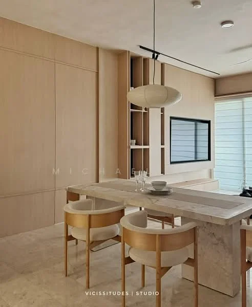 Dining features: marble dining table, 4 upholstered dining chairs in cream, wooden cabinetry with light wood finish, built-in shelving unit, wall-mounted TV, large window with horizontal blinds, neutral wall colour, recessed ceiling lights, pendant light fixture; style: modern.