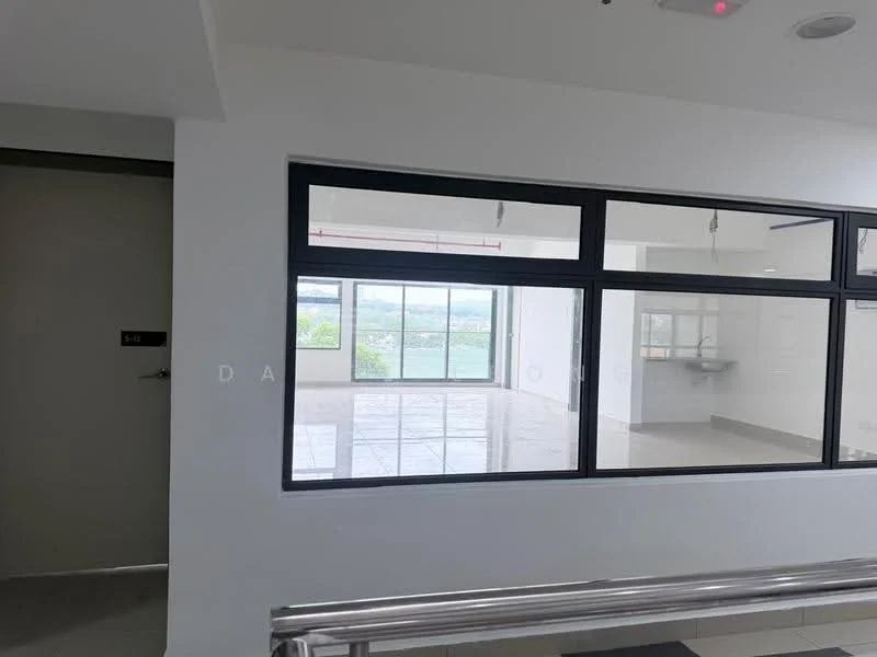 Room features: large floor-to-ceiling windows, white painted walls, grey tiled flooring, open layout, view of greenery, kitchen area visible in background, recessed ceiling lights, sliding glass door; style: modern; view: garden.