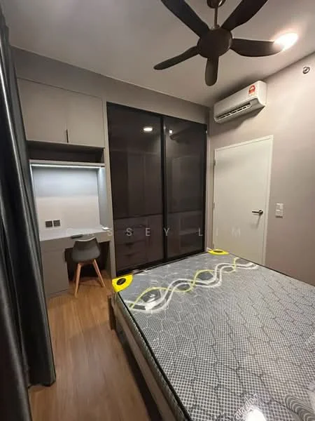 Bedroom features: queen-size bed, upholstered headboard, wooden flooring, built-in wardrobe with glass doors, study desk with chair, wall-mounted air conditioning unit, ceiling fan, grey painted walls, curtains, decorative wall art; style: modern.