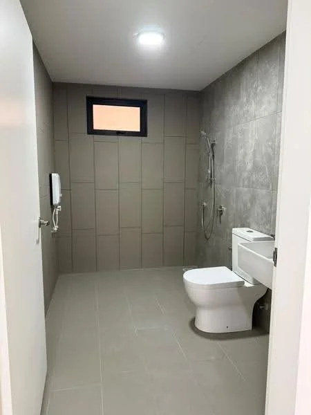 Bathroom features: grey tiled walls, light grey tile flooring, one-piece toilet, wall-mounted shower with handheld showerhead, small window, built-in shower niche, single-sink vanity with cabinet, recessed ceiling light; style: modern.