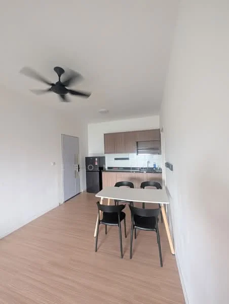 Dining features: light wood flooring, white painted walls, 5-blade ceiling fan, dining table with four black chairs, kitchen area visible in background, refrigerator, kitchen cabinetry, countertop with sink; style: modern.