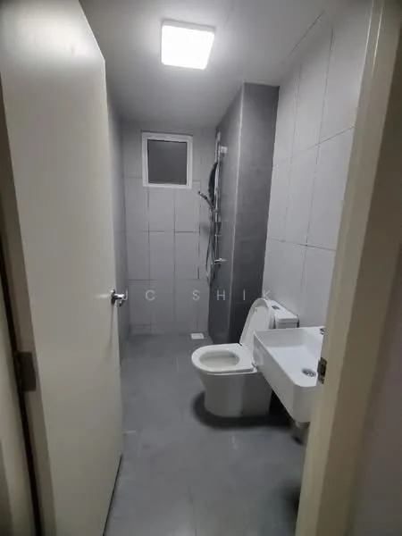 Bathroom features: grey tile flooring, grey wall tiles, white toilet, wall-mounted sink, shower with glass partition, chrome showerhead, ceiling light fixture, small window; style: modern.