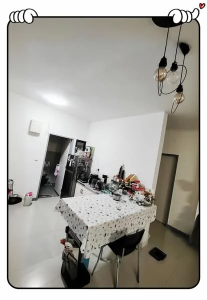 Kitchen features: white painted walls, grey tile flooring, table with patterned tablecloth, black dining chairs, recessed downlights, hanging pendant lights, stainless-steel fridge, built-in oven, microwave, kitchen cabinets, sink, countertop, open shelving; style: modern.