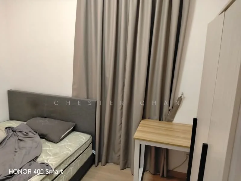 Bedroom features: grey upholstered bed frame, mattress on bed frame, grey bedding, wooden bedside table, curtains in light grey, laminate flooring, wall-mounted light switch, white walls; style: modern.