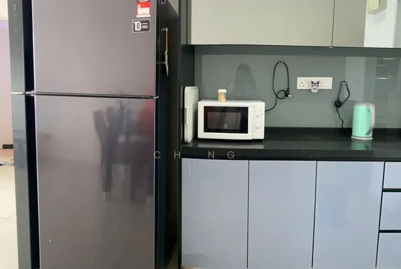 Kitchen features: black granite countertop, grey flat-panel cabinets, stainless-steel fridge, built-in microwave, kettle, black backsplash, wall-mounted electrical outlets, dining table visible in background; style: modern.