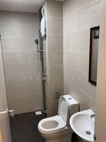 Bathroom features: grey tiled walls, dark grey tile flooring, walk-in shower with glass enclosure, chrome shower head, wall-mounted shower control, white toilet, white pedestal sink, framed mirror; style: modern.
