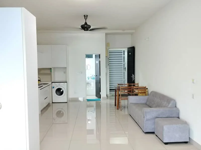 Living features: grey fabric sofa, single armchair, wooden dining table with four chairs, white cabinetry, built-in kitchen with white cabinets, stainless-steel sink, freestanding washing machine, recessed downlights, ceiling fan, glossy tile flooring, white painted walls, door leading to bathroom, open layout; style: modern.