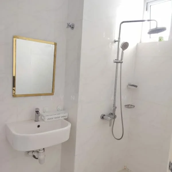 Bathroom features: white tiled walls, shower area with glass partition, rain shower head, handheld shower, chrome shower faucet, wall-mounted mirror with gold frame, white wall-mounted sink, chrome sink faucet, built-in soap shelf; style: modern.