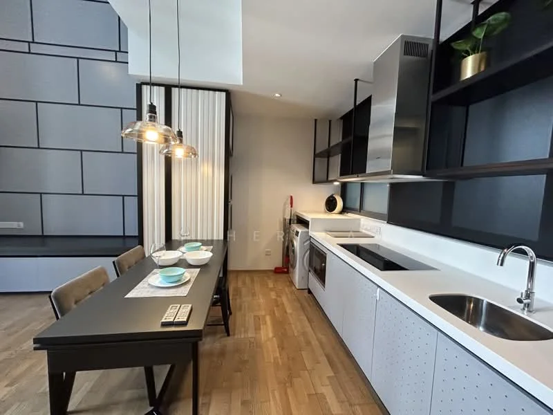 Kitchen features: black dining table with 4 chairs, white cabinetry with perforated design, stainless-steel sink, chrome pull-down faucet, built-in oven, stainless-steel range hood, ceramic cooktop, open shelving, wooden flooring, pendant lighting, decorative plant on shelf; style: modern.
