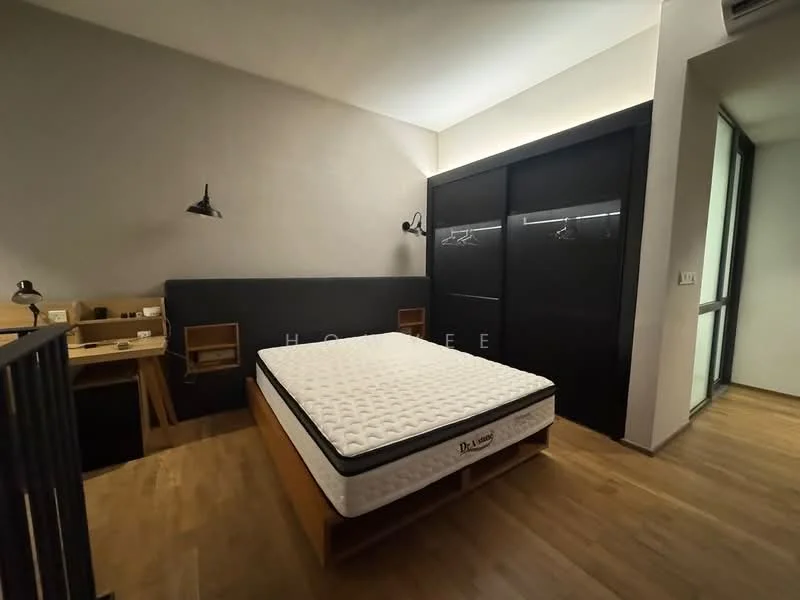Bedroom features: queen-size bed with mattress, wooden bed frame, black built-in wardrobe with sliding doors, wooden flooring, desk with drawers, wall-mounted reading lights, air conditioning unit, large window with natural light; style: modern.