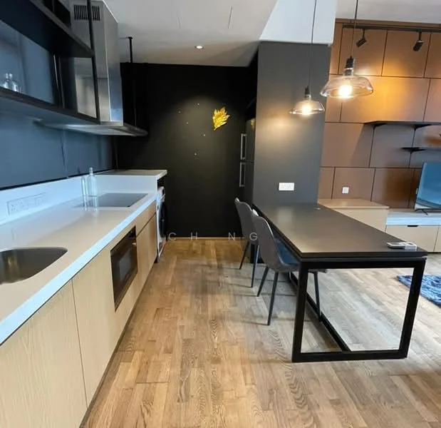 Kitchen features: white countertop, wood cabinetry, stainless-steel sink, chrome pull-down faucet, built-in oven, freestanding range oven, refrigerator, pendant lighting, wood flooring, black accent wall, dining table with black legs, four black dining chairs; style: modern.