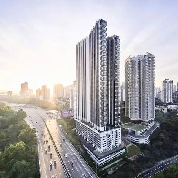 Exterior type: high-rise condominium; features: glass curtain wall, projecting balconies, surrounded by mature greenery, urban skyline view in background, multiple storeys, landscaped podium, road access, adjacent to highway; style: modern.