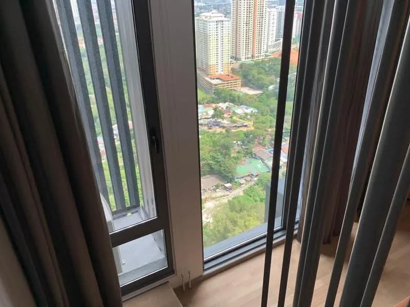 Room features: floor-to-ceiling windows, grey curtains, wooden flooring, city view; view: city.