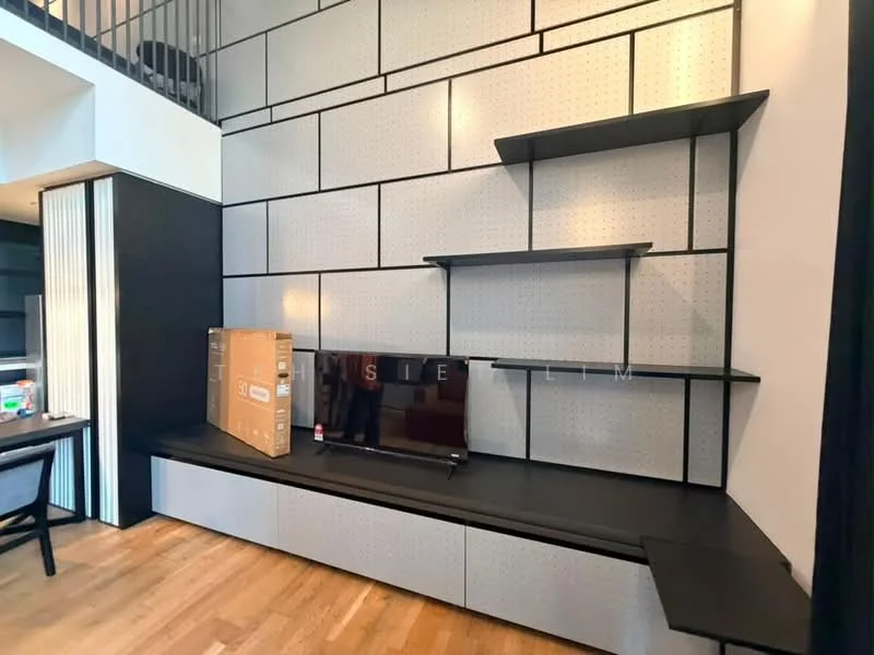 Living features: black wall-mounted shelves, white perforated wall panels, black built-in bench seating, wooden flooring, TV console, flat-screen TV, cardboard box, decorative wall design; style: modern.