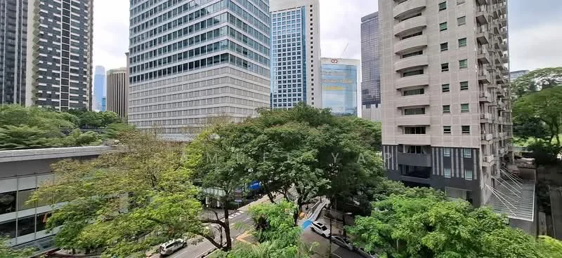 Exterior type: high-rise condominium; features: glass curtain wall facade, surrounded by mature greenery, urban context with city skyline, multiple high-rise buildings, tree canopy visible, street view with vehicles, modern architectural design; style: modern.
