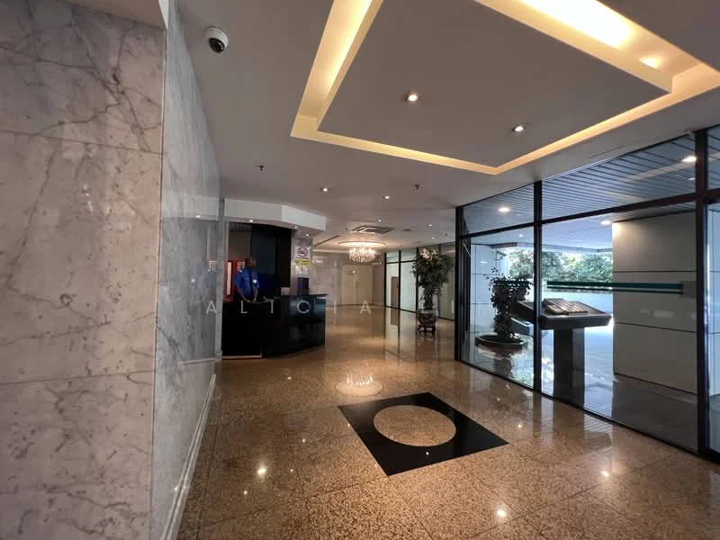 Lobby features: marble flooring, polished granite flooring, reception desk, glass entrance doors, indoor plants, ceiling lights, decorative wall paneling, information display board; style: modern; view: courtyard.