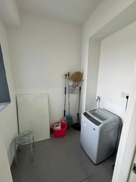Laundry features: top-load washing machine, white walls, grey tile flooring, small stool, cleaning supplies rack, mop, broom, pink laundry basket, blank wall space.