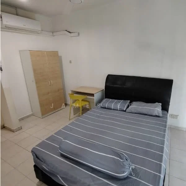 Bedroom features: queen-size bed with black upholstered headboard, grey striped bedding, wooden wardrobe with light wood finish, study desk with light wood finish, yellow chair, wall-mounted air conditioning unit, tile flooring, white painted walls, ceiling light fixture; style: minimalist.