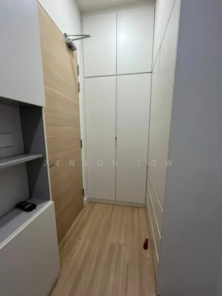 Room features: light wood flooring, white painted walls, built-in cabinetry with white finish, wooden door, shelving unit, minimalist design, neutral color palette; style: modern.