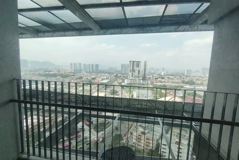 Room features: balcony with metal railing, glass roof, city skyline view, concrete flooring, surrounding urban landscape, visible high-rise buildings, mountain view in distance, partially cloudy sky; style: modern; view: city.