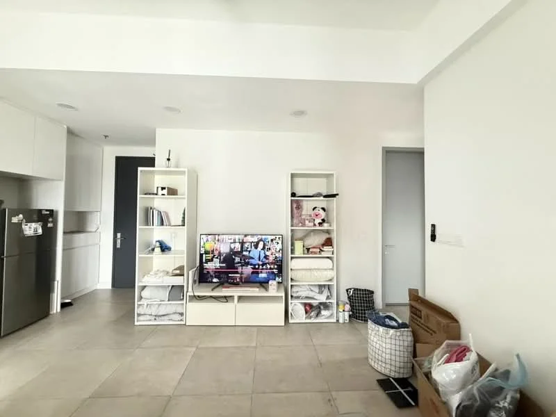 Living features: white painted walls, tile flooring, recessed downlights, built-in shelving unit, freestanding TV cabinet, wall-mounted TV, storage boxes, laundry basket; style: modern. Kitchen features: white cabinetry, stainless-steel refrigerator; style: modern.