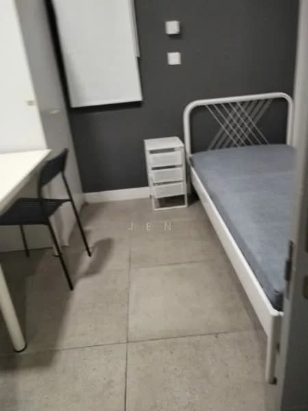 Bedroom features: single bed with white frame, grey mattress, white bedside table with drawers, black dining chair, white desk, grey painted walls, concrete flooring, wall-mounted whiteboard, two electrical outlets; style: modern.