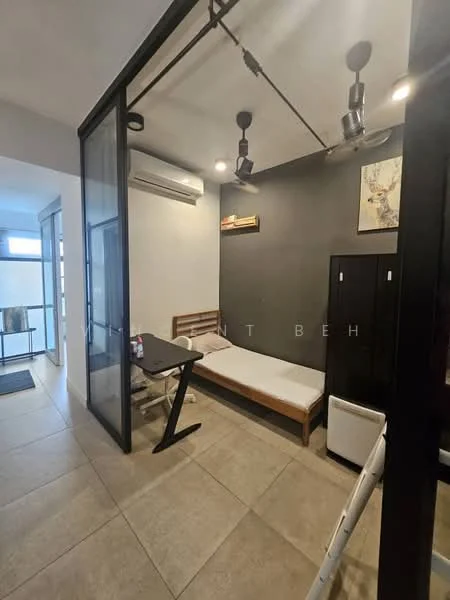 Room features: grey accent wall, white painted walls, tile flooring, 1 wall-mounted split AC, 2-blade ceiling fan, wooden bed frame without mattress, small dining table with chair, black wardrobe, framed artwork on wall, sliding glass door, open shelving unit; style: modern.