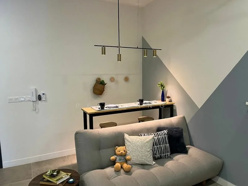 Living features: grey fabric sofa, decorative throw pillows, coffee table, pendant lighting with three bulbs, wall-mounted intercom, open shelving with decorative items, neutral painted walls, tile flooring; style: modern.