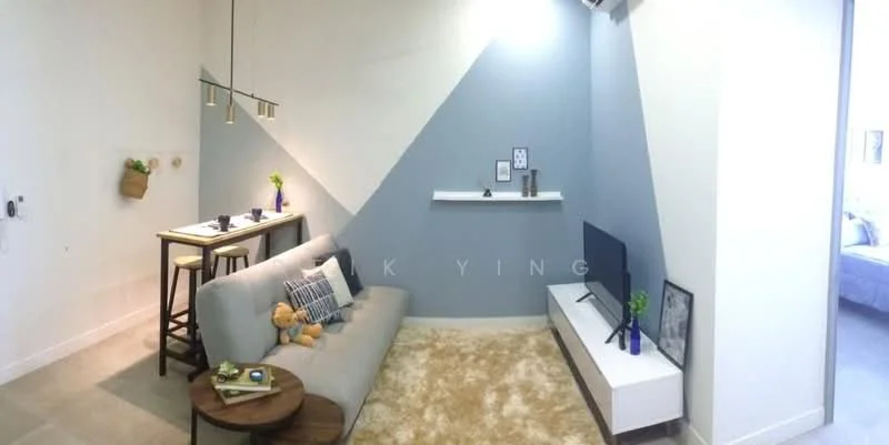 Living features: grey fabric sofa, area rug with geometric pattern, wooden coffee table, wall-mounted TV, white TV console, decorative wall shelf, blue accent wall, white walls, pendant lighting, decorative items on shelf, small potted plant, teddy bear decor; style: modern.