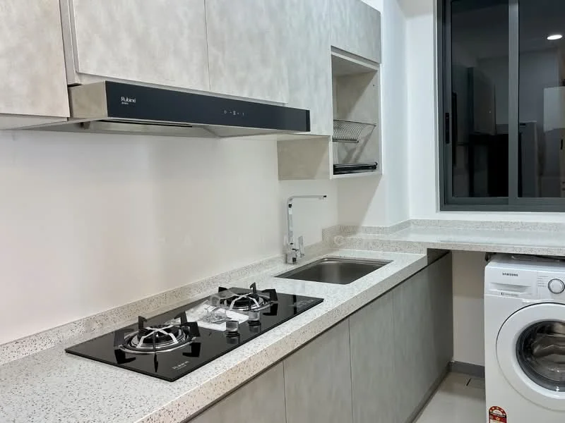 Kitchen features: grey laminate cabinetry, white speckled countertop, built-in gas hob with two burners, stainless-steel sink, chrome pull-down faucet, built-in kitchen hood, open shelving, freestanding washing machine, large window for natural light, tile flooring; style: modern.