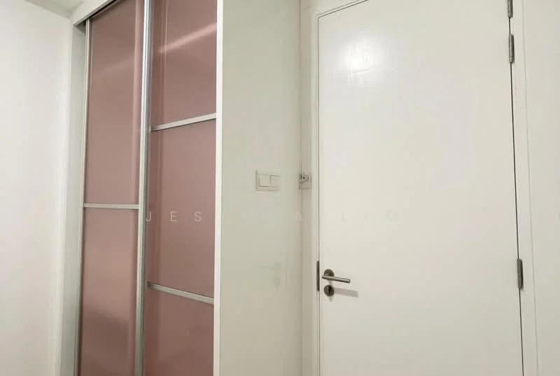 Room features: white painted walls, white door, sliding glass door with pink panels, light-colored flooring, door handle, light switch; style: modern.